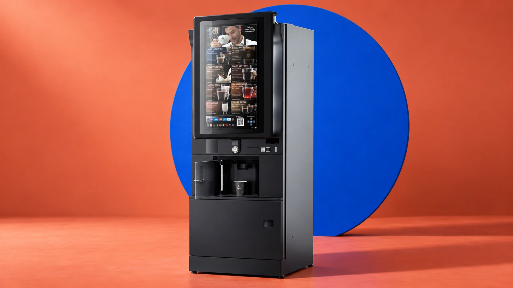 Rheavendors FS2 Touch Kaffeeautomat in korallenrotem Studio vor einer kobaltblauen Kreisform – Markenillustration